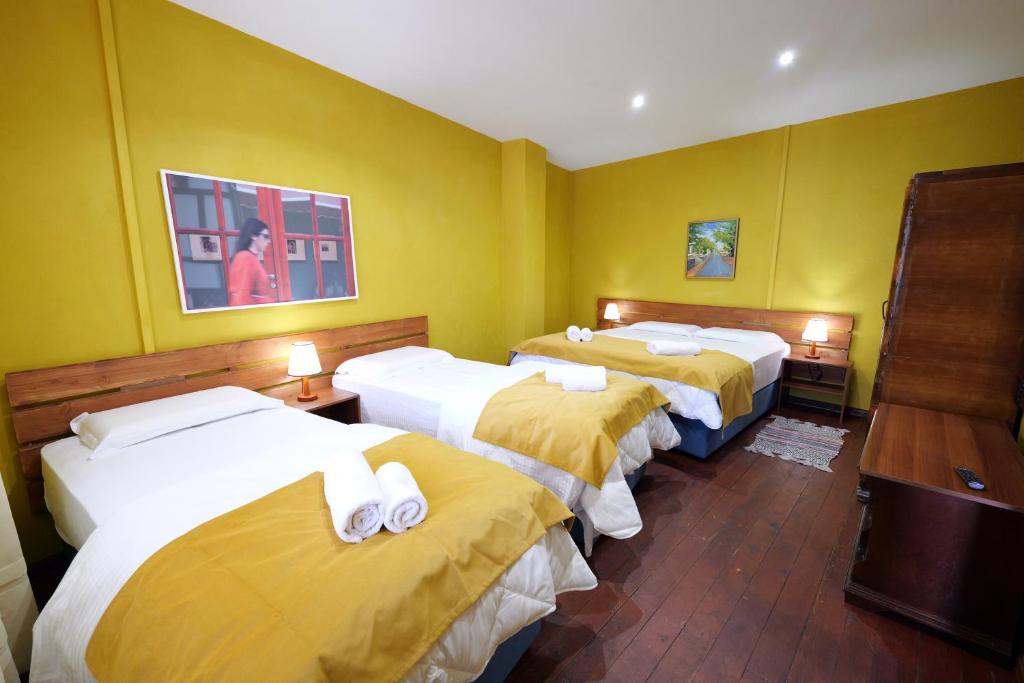 Postel nebo postele na pokoji v ubytování Guesthouse n'Odë