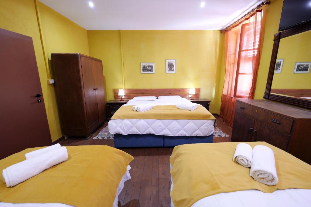 Postel nebo postele na pokoji v ubytování Guesthouse n'Odë