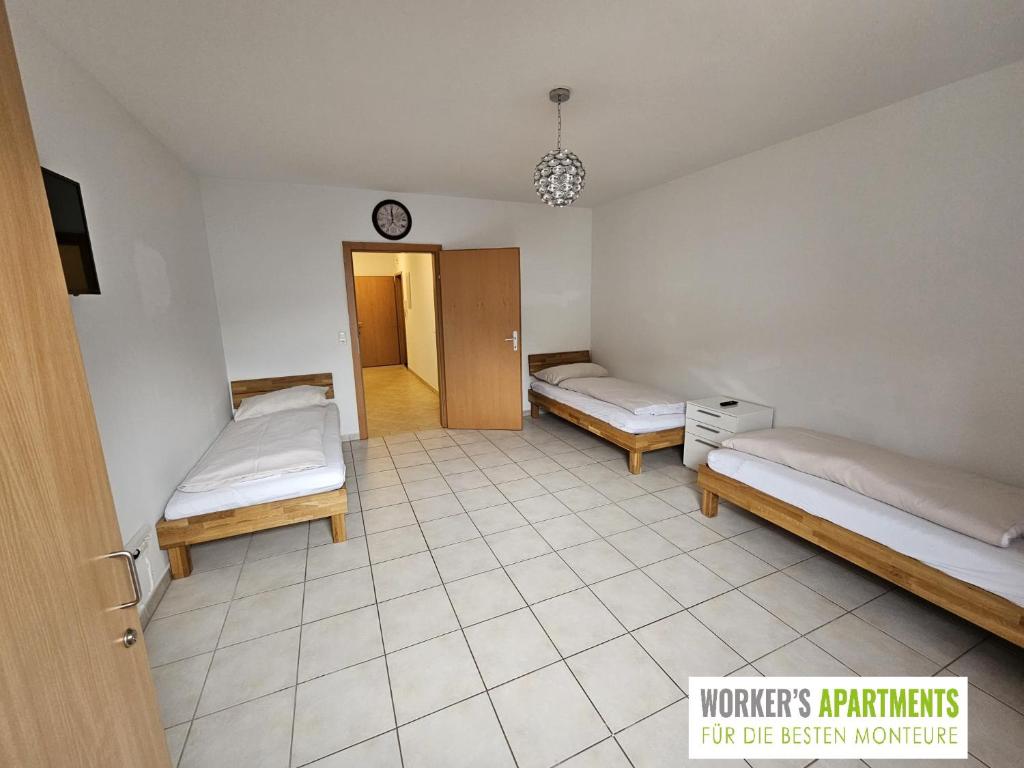 Postel nebo postele na pokoji v ubytování Workers Apartment für die besten Monteure in 8600 Bruck Mur und in 8700 Leoben
