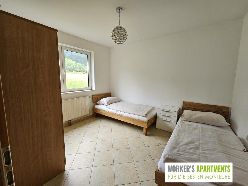 Postel nebo postele na pokoji v ubytování Workers Apartment für die besten Monteure in 8600 Bruck Mur und in 8700 Leoben