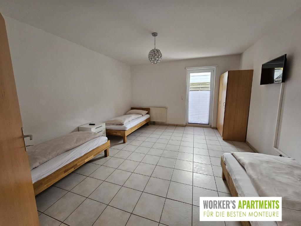 Postel nebo postele na pokoji v ubytování Workers Apartment für die besten Monteure in 8600 Bruck Mur und in 8700 Leoben