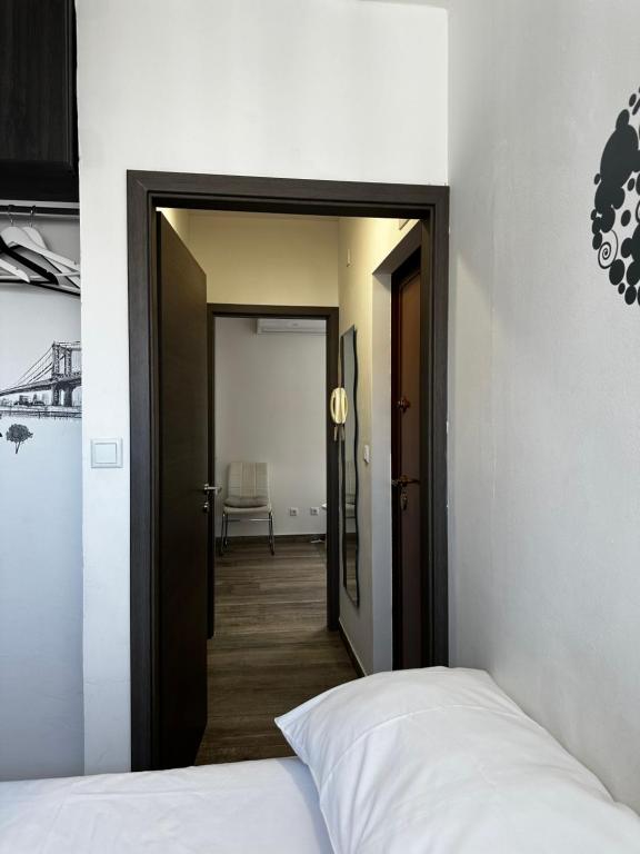 Postel nebo postele na pokoji v ubytování Apartman FOX