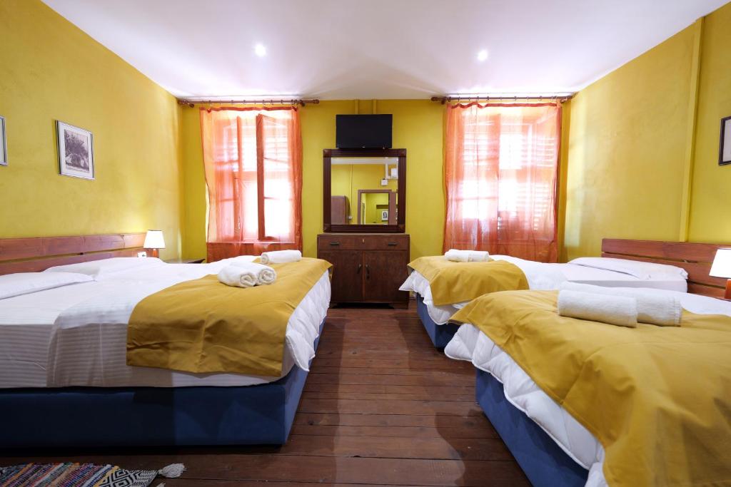 Postel nebo postele na pokoji v ubytování Guesthouse n'Odë