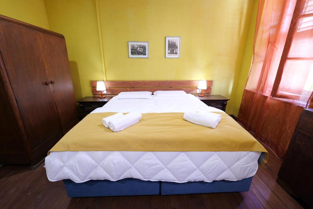 Postel nebo postele na pokoji v ubytování Guesthouse n'Odë