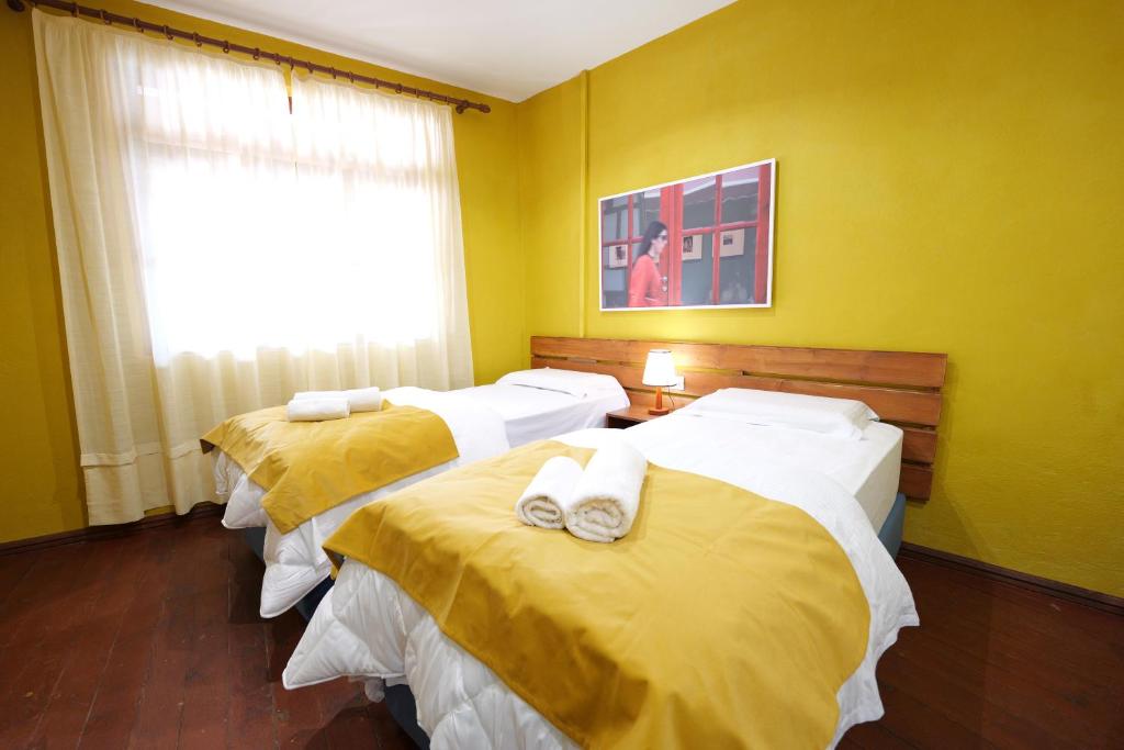 Postel nebo postele na pokoji v ubytování Guesthouse n'Odë