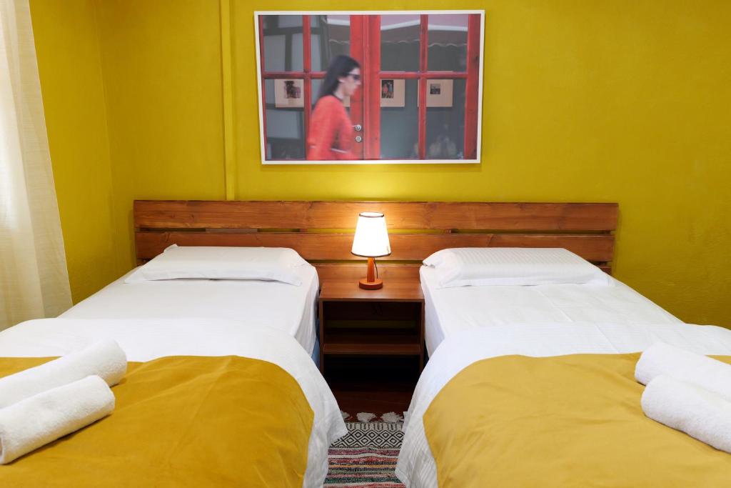 Postel nebo postele na pokoji v ubytování Guesthouse n'Odë
