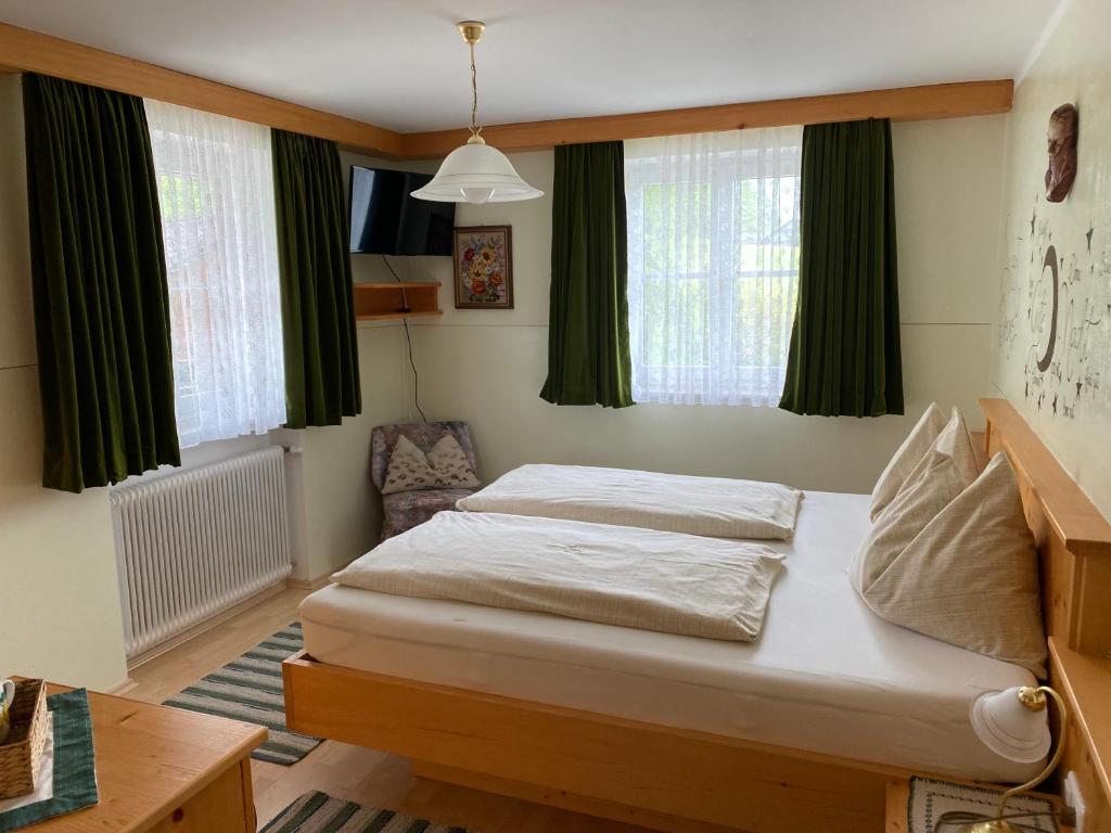 Postel nebo postele na pokoji v ubytování Maislbauer