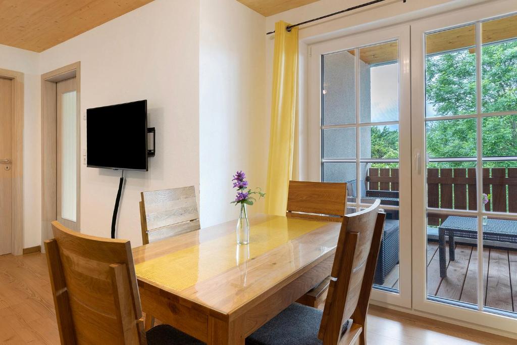TV a/nebo společenská místnost v ubytování Ferienhaus Heerlichkeit