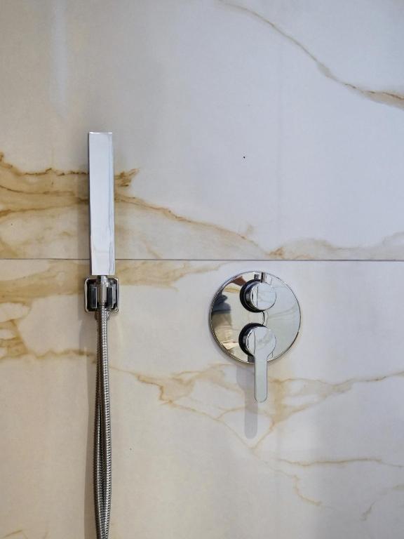 a shower head and a shower at Villa Tonia in Himare