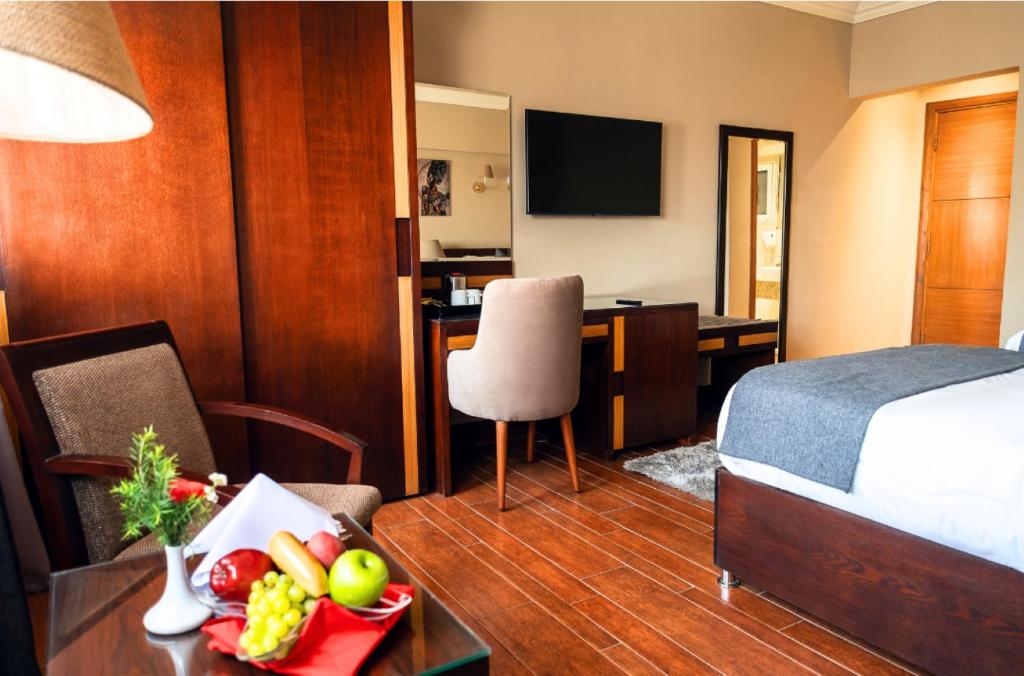 Postel nebo postele na pokoji v ubytování Marwa Palace Hotel Cairo