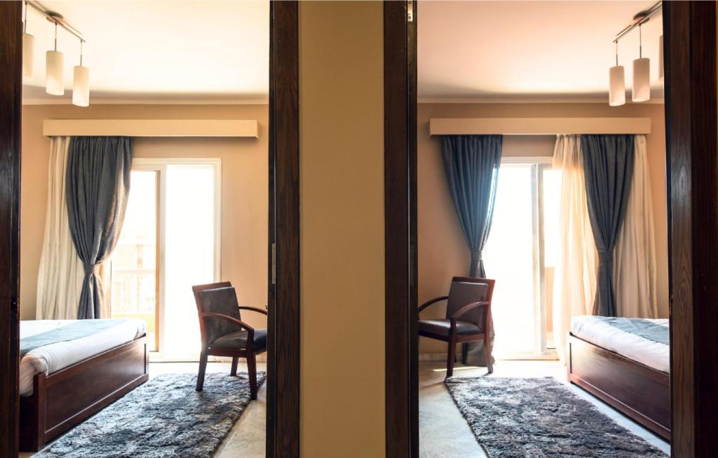 Postel nebo postele na pokoji v ubytování Marwa Palace Hotel Cairo