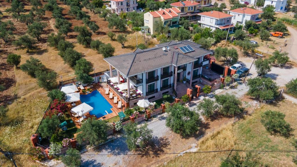 an overhead view of a house with a pool at Cunda EYE in Cunda