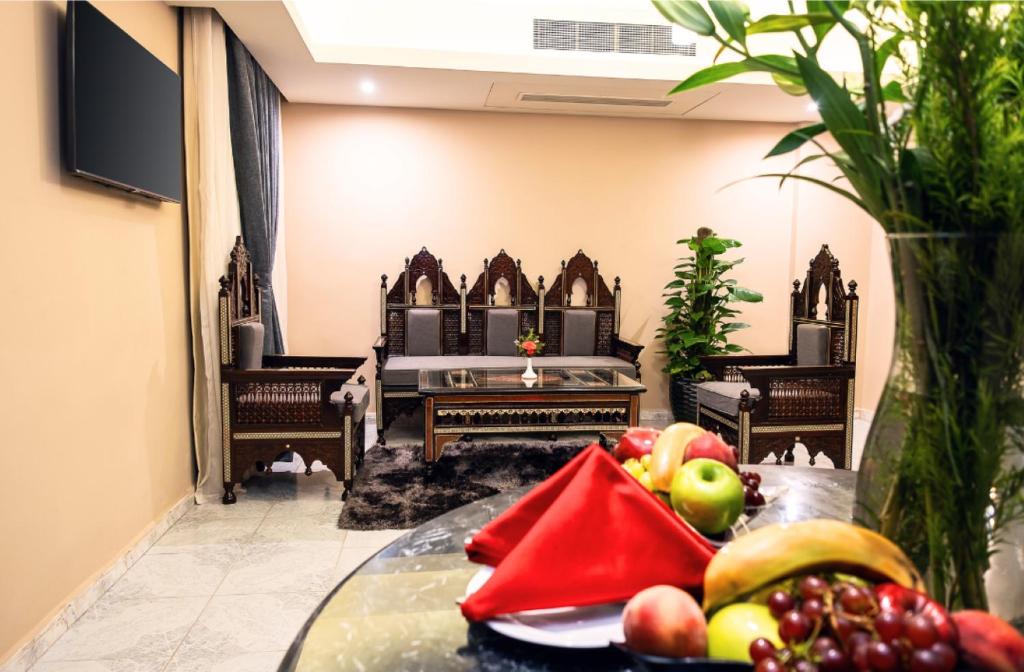 TV a/nebo společenská místnost v ubytování Marwa Palace Hotel Cairo