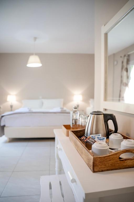 Postel nebo postele na pokoji v ubytování Avra Hotel 2