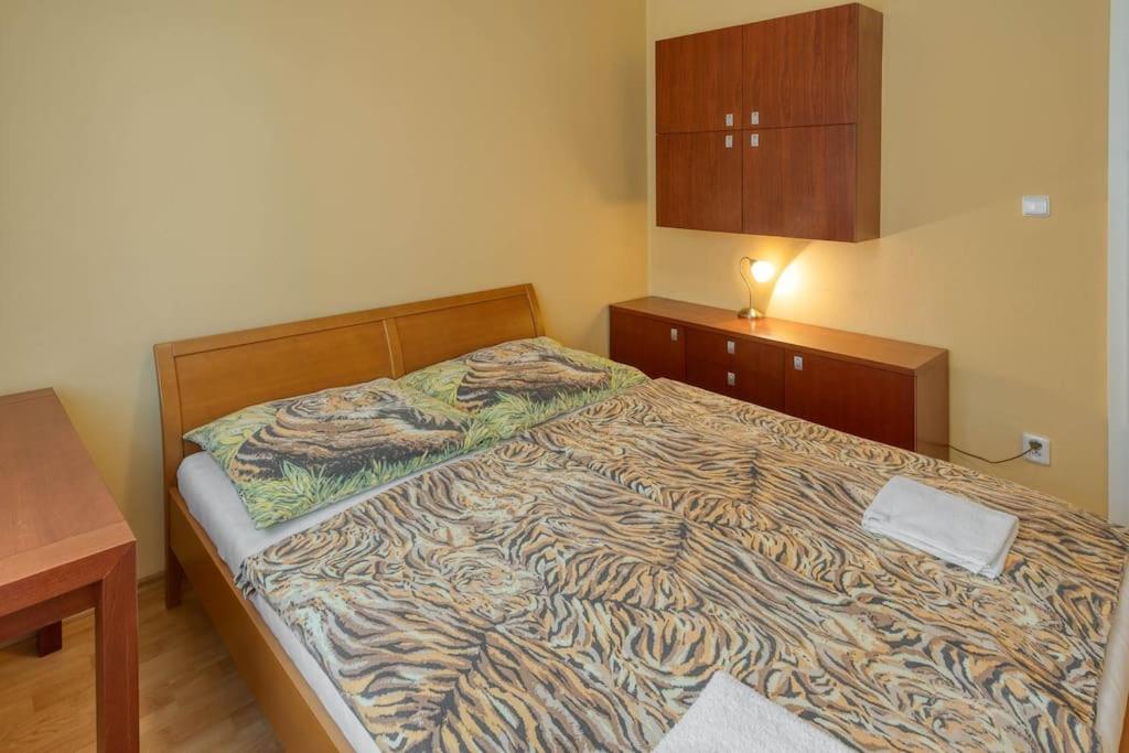 Postel nebo postele na pokoji v ubytování vila Karolína