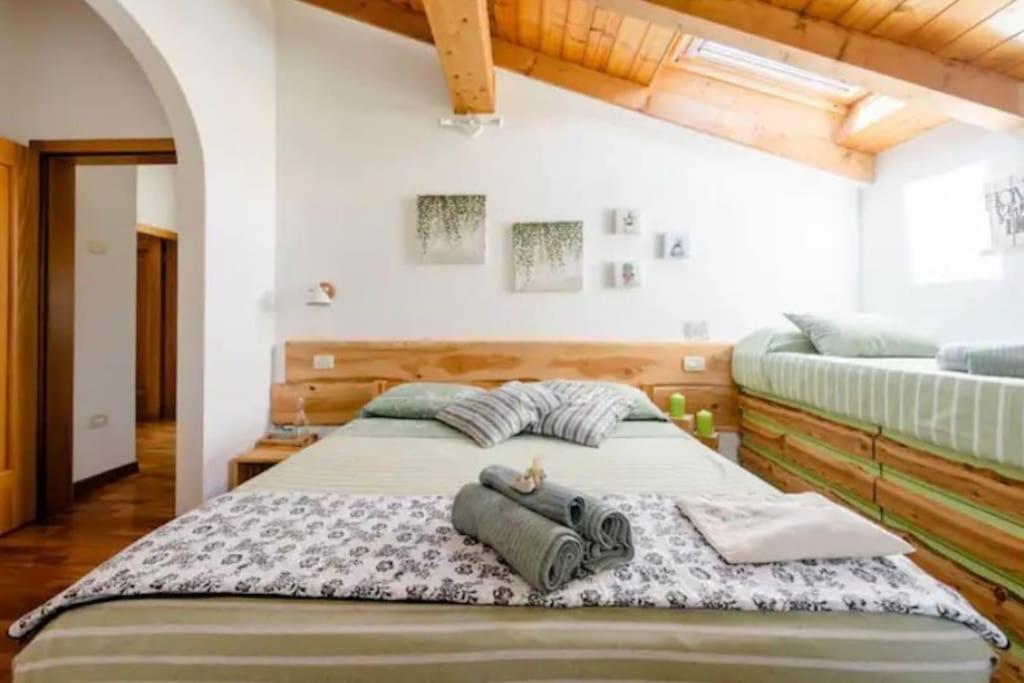 Postel nebo postele na pokoji v ubytování Cà Ulivi