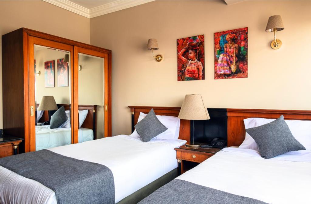 Postel nebo postele na pokoji v ubytování Marwa Palace Hotel Cairo