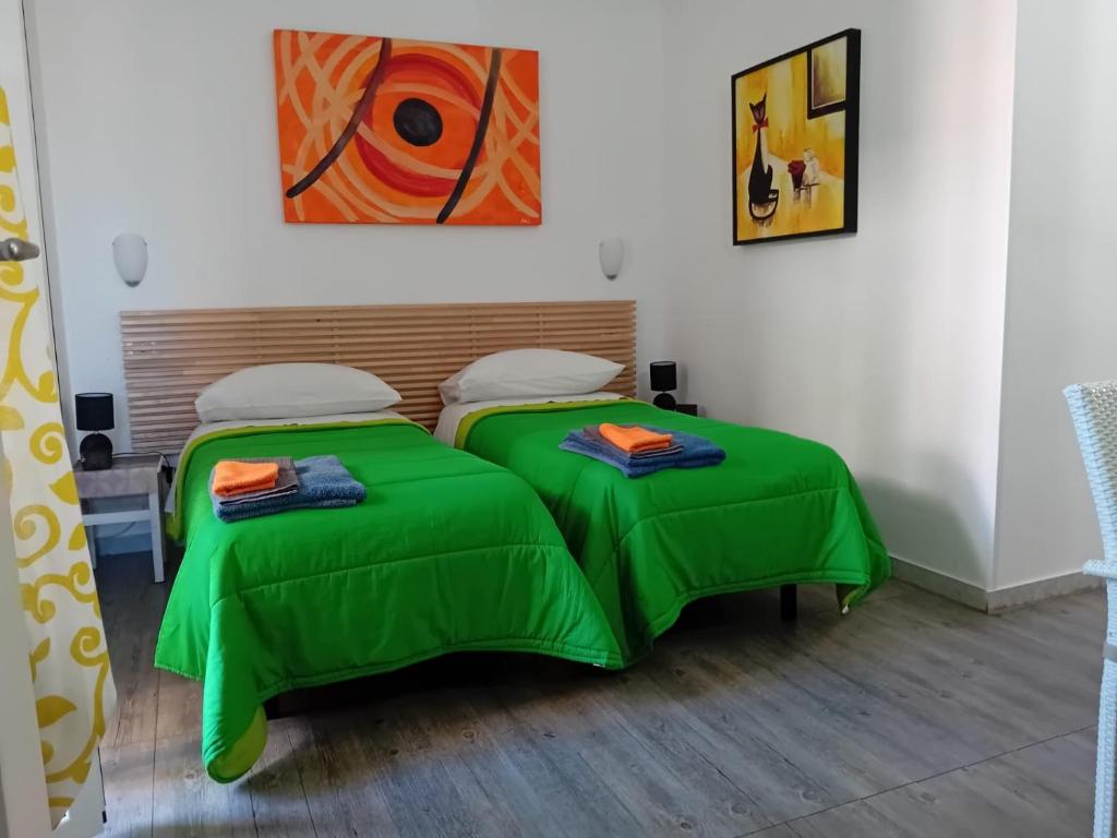 Postel nebo postele na pokoji v ubytování B&B Ciccio