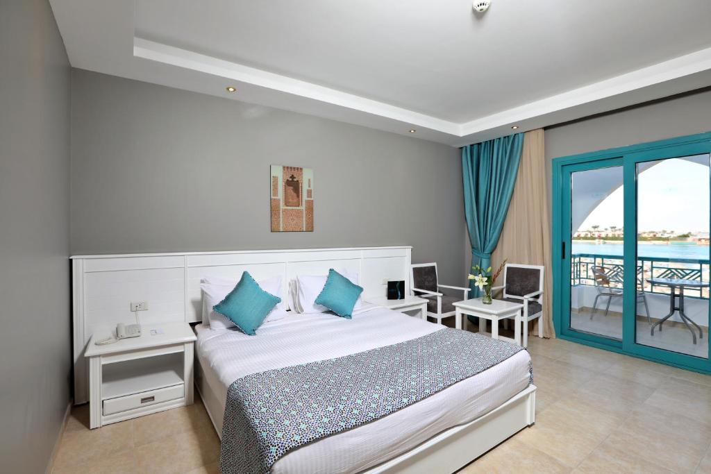 Postel nebo postele na pokoji v ubytování Sunrise Garden Beach Resort