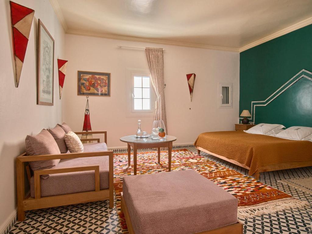 Postel nebo postele na pokoji v ubytování Ryad Watier & SPA