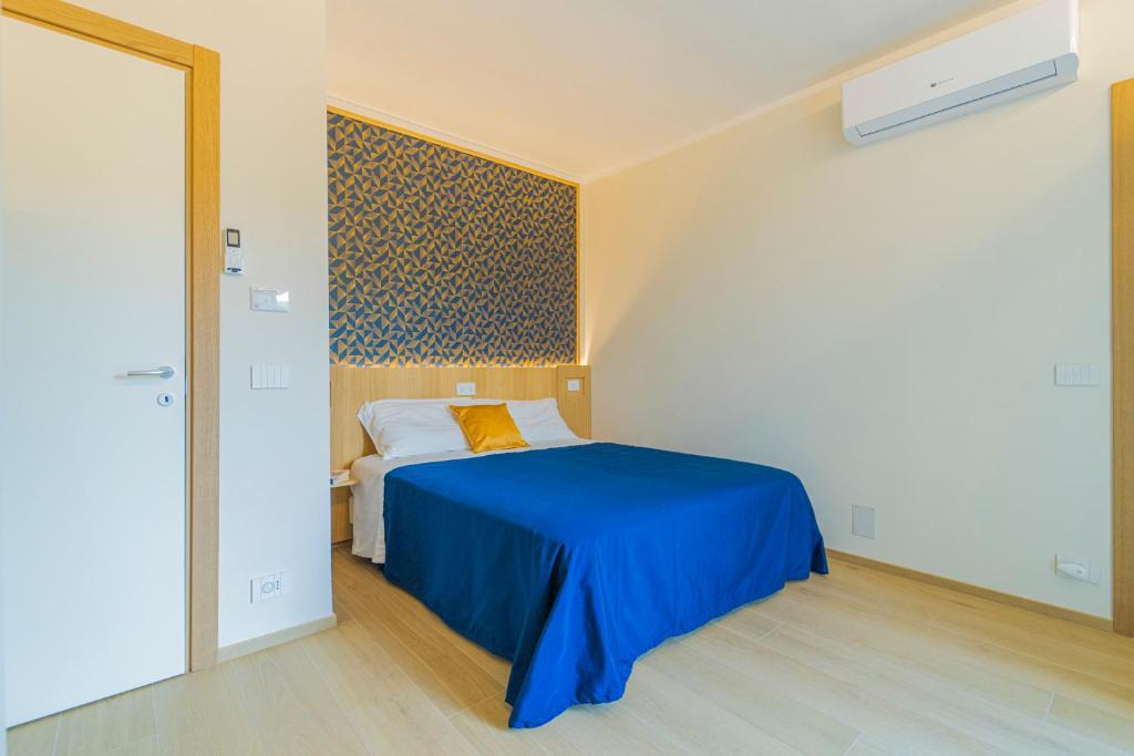 Postel nebo postele na pokoji v ubytování B&B Lo Zefiro
