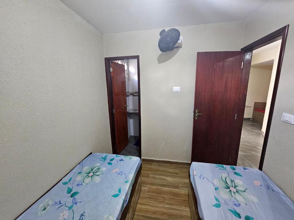 Postel nebo postele na pokoji v ubytování Pousada dos Filhos