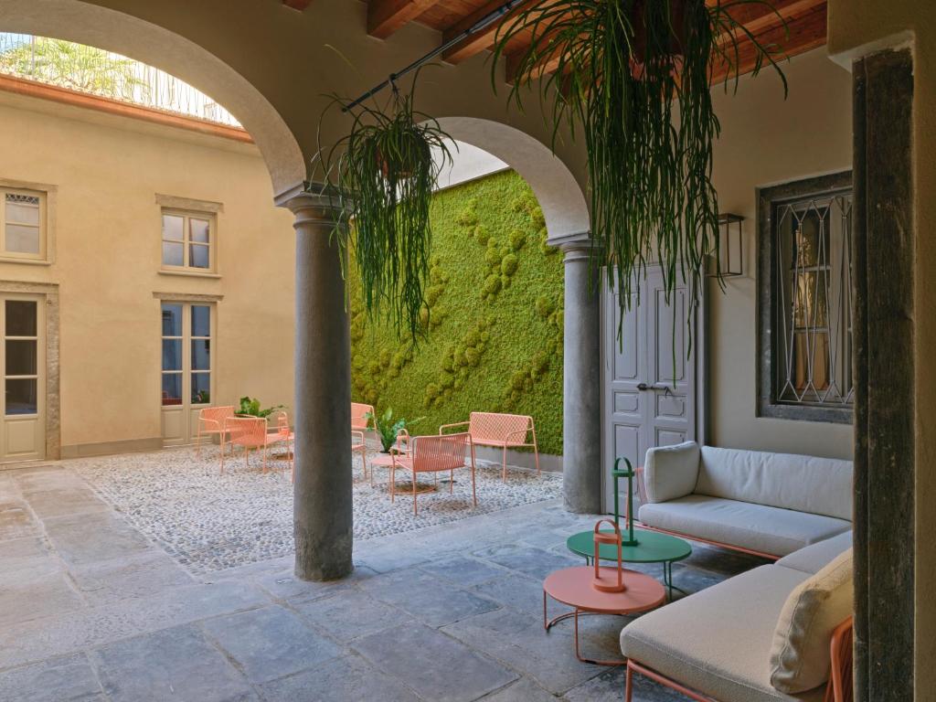 Posedenie v ubytovaní REGO APARTMENTS - Boutique Aparthotel & Serenity Spa with some off-site apartments in the Heart of Bergamo City Center