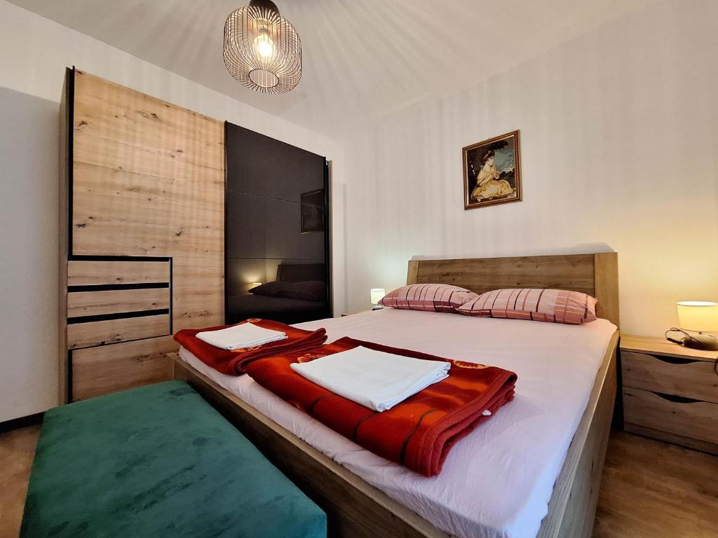 Posteľ alebo postele v izbe v ubytovaní Apartments Frutis