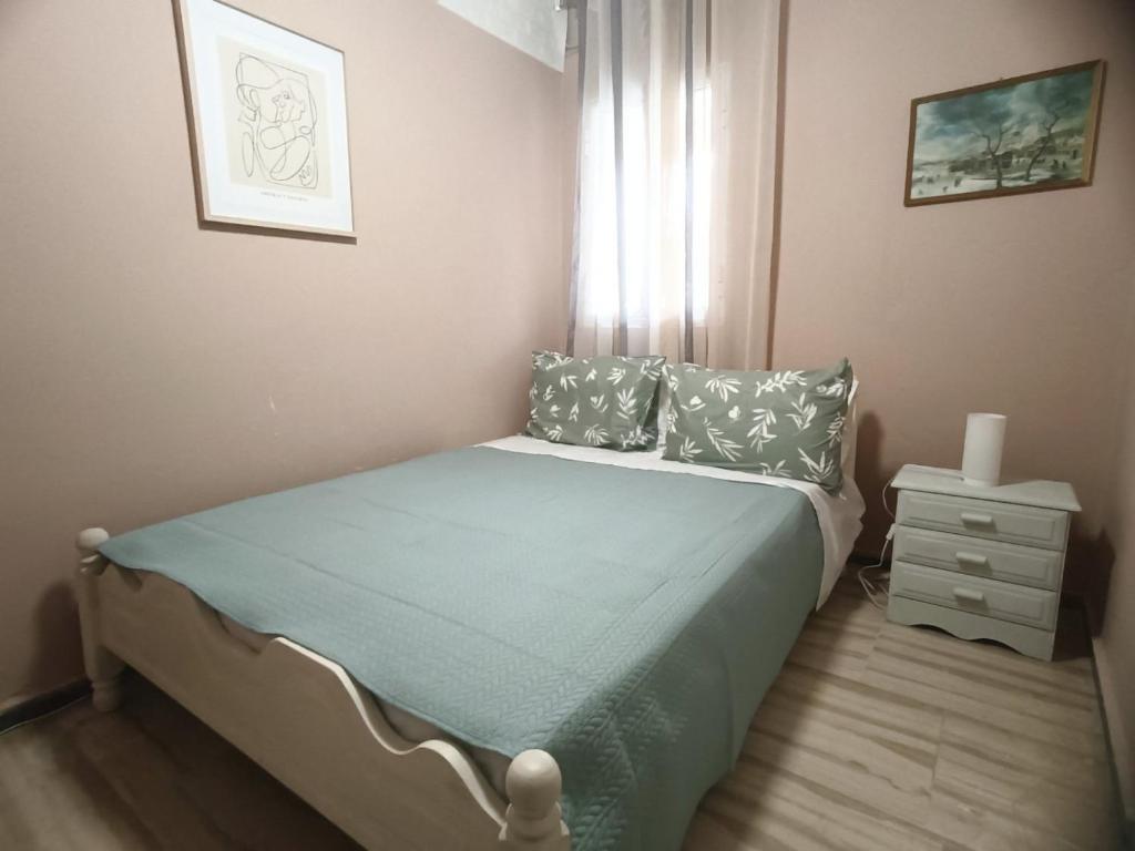 Postel nebo postele na pokoji v ubytování Casa Menidi