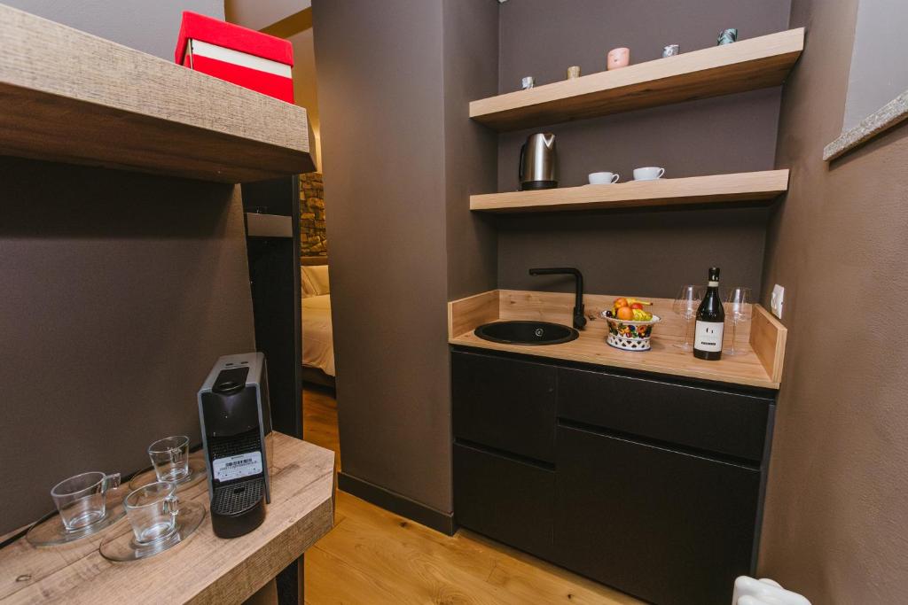 Kuchyň nebo kuchyňský kout v ubytování Garesio Wine Resort