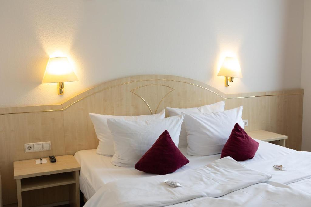 Postel nebo postele na pokoji v ubytování Hotel Kübler