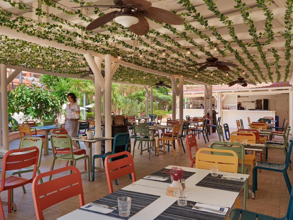 Reštaurácia alebo iné gastronomické zariadenie v ubytovaní H10 Mediterranean Village