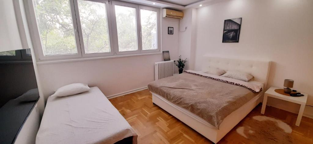 Postel nebo postele na pokoji v ubytování Apartman Durmitor
