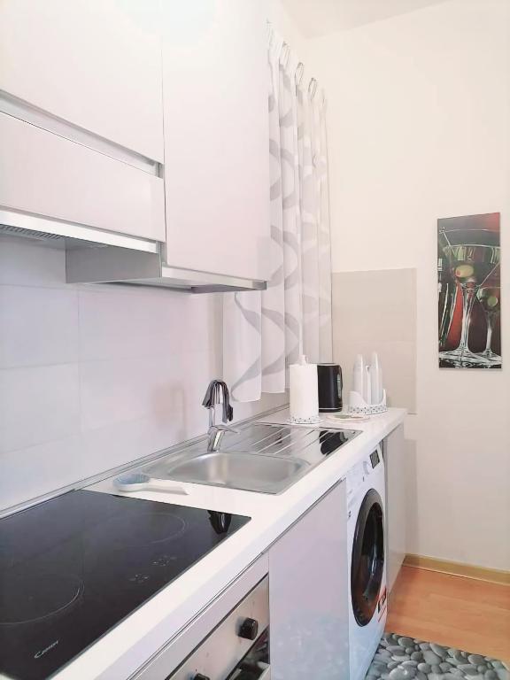 Kuchyňa alebo kuchynka v ubytovaní Casa Vacanze VITTORIA