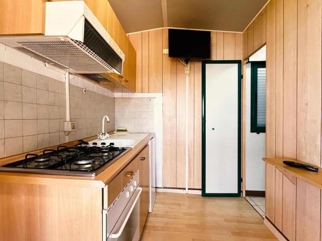Kuchyň nebo kuchyňský kout v ubytování Residence Punta Cilento