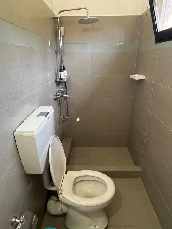 Salle de bains dans l'établissement La Mirage