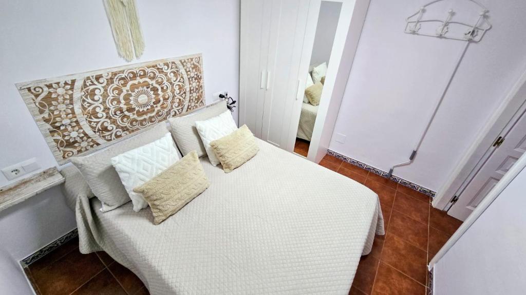 Postel nebo postele na pokoji v ubytování VILLA PITATO Nuevo, cerca de la Playa, Parking en la puerta del alojamiento