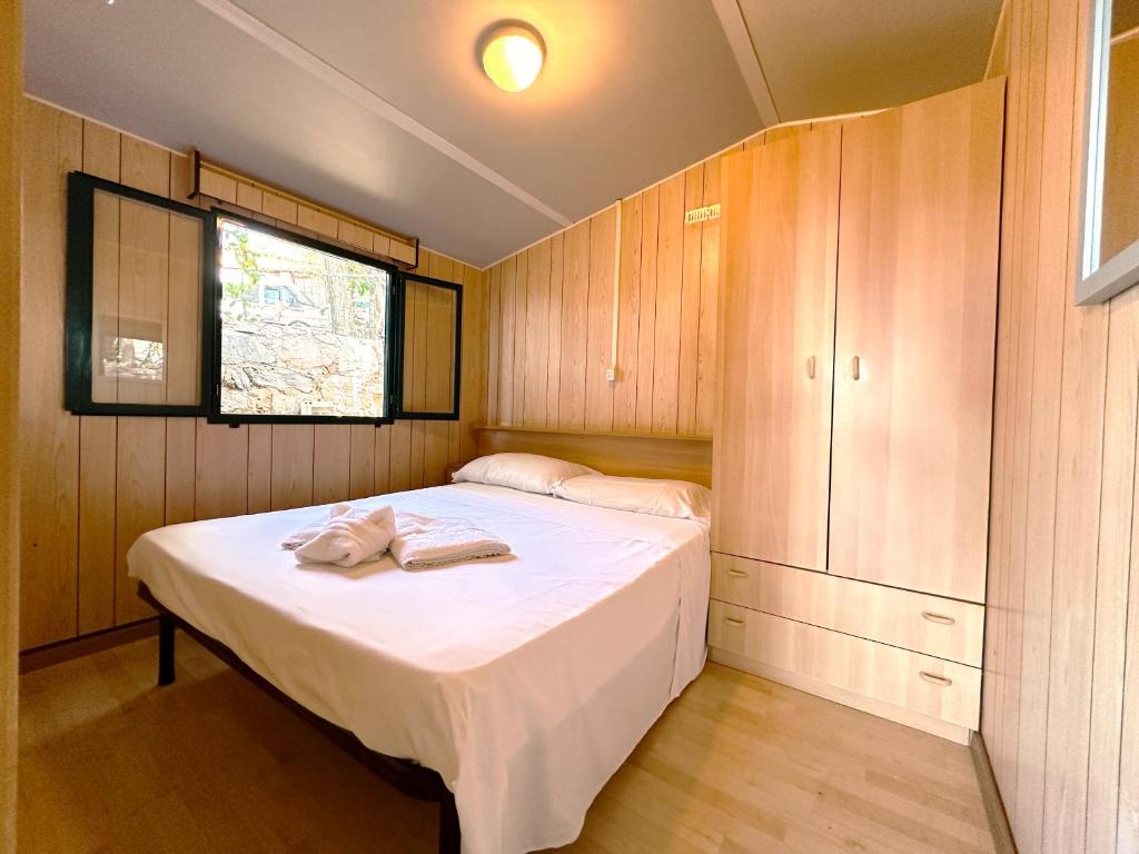 Postel nebo postele na pokoji v ubytování Residence Punta Cilento