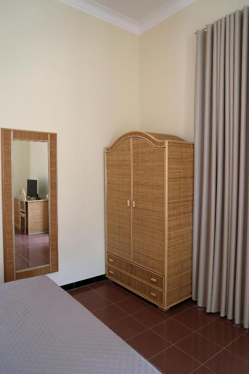 Postel nebo postele na pokoji v ubytování Hotel della Piazza