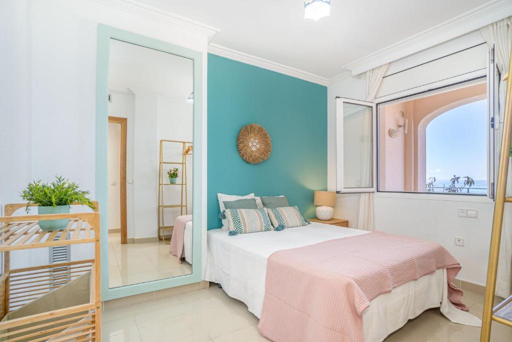 A bed or beds in a room at BADIA DE ROSES 2 new apartment
