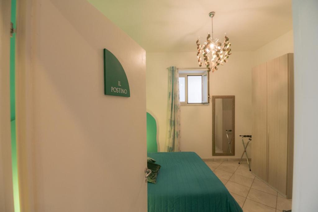 Koupelna v ubytování L'Isola Del Postino Rooms