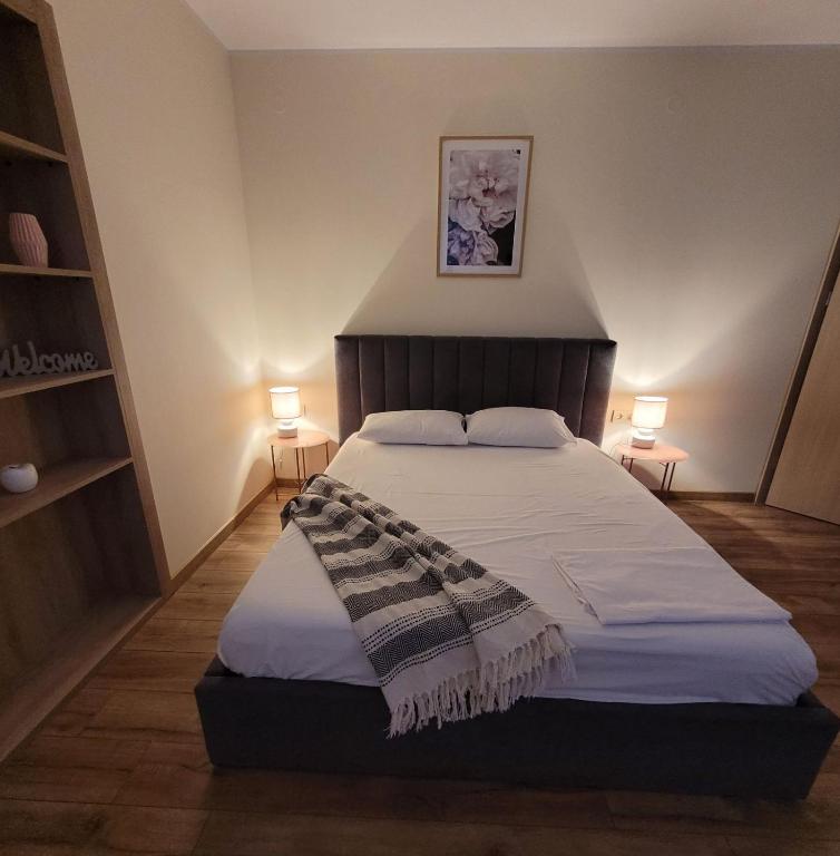 Postel nebo postele na pokoji v ubytování The House - Central Boutique Apartments