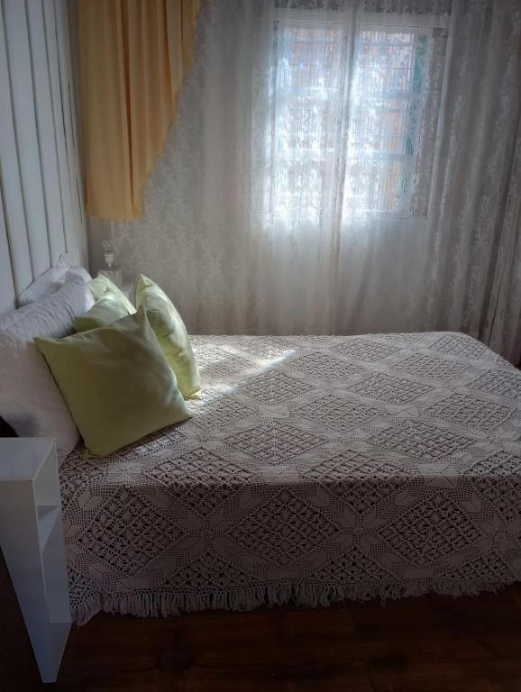 Voodi või voodid majutusasutuse Simples e confortável toas