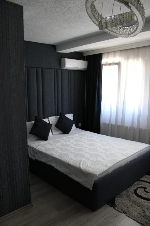 Postel nebo postele na pokoji v ubytování Hotel Cleon