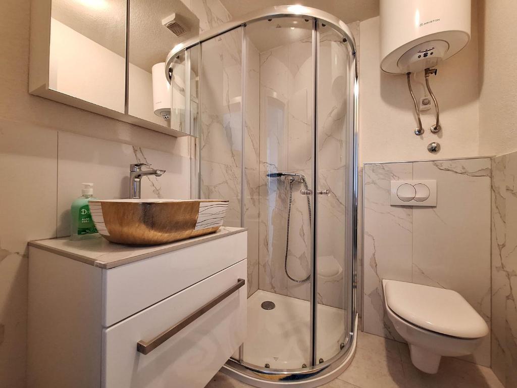 Kúpeľňa v ubytovaní Apartments Frutis
