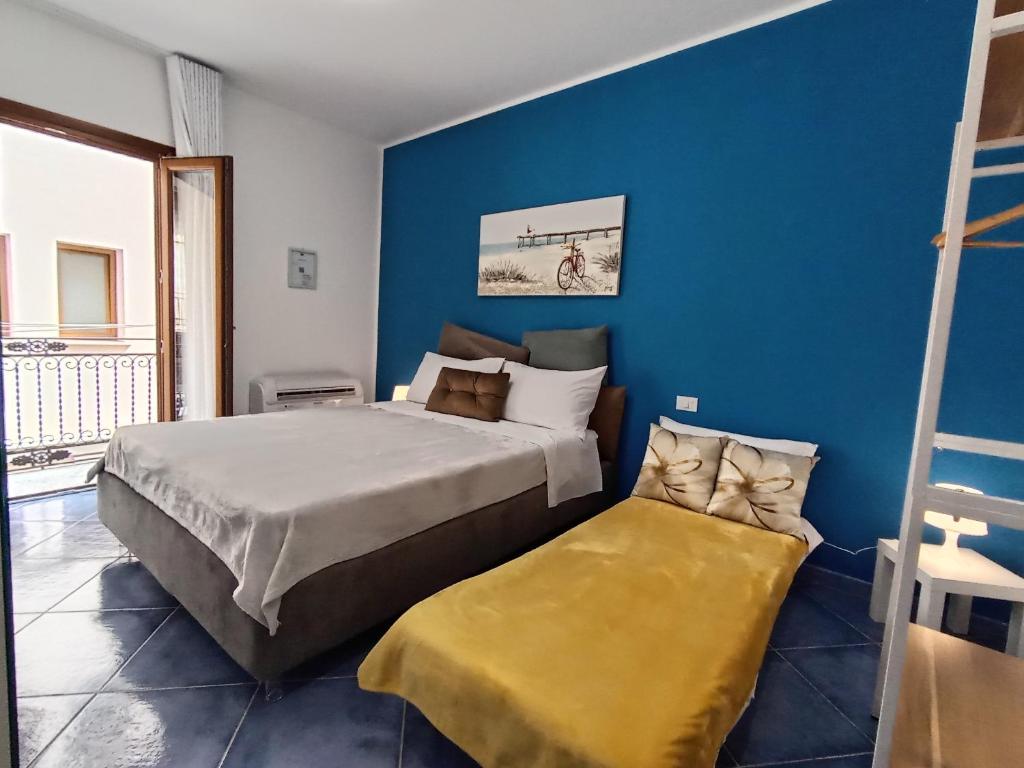 En eller flere senge i et værelse på OiKos Design