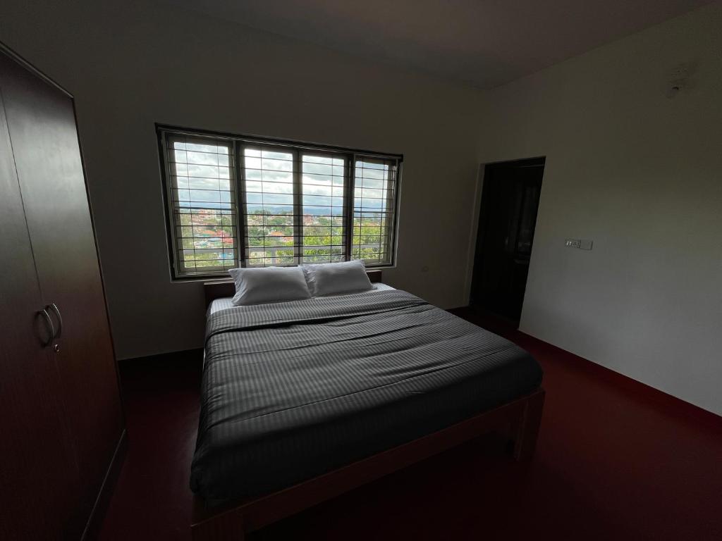 Voodi või voodid majutusasutuse ABODE Backpacker's Hostel toas