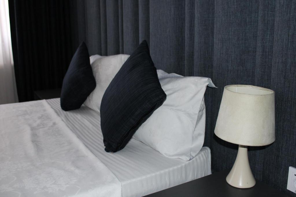 Postel nebo postele na pokoji v ubytování Hotel Cleon