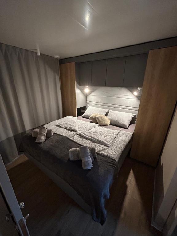 Postel nebo postele na pokoji v ubytování Mobile home TIM