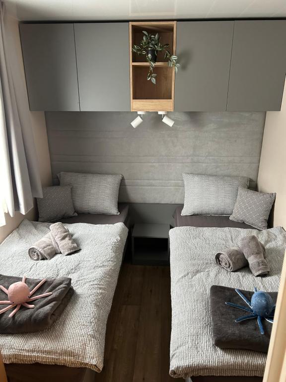 Postel nebo postele na pokoji v ubytování Mobile home TIM
